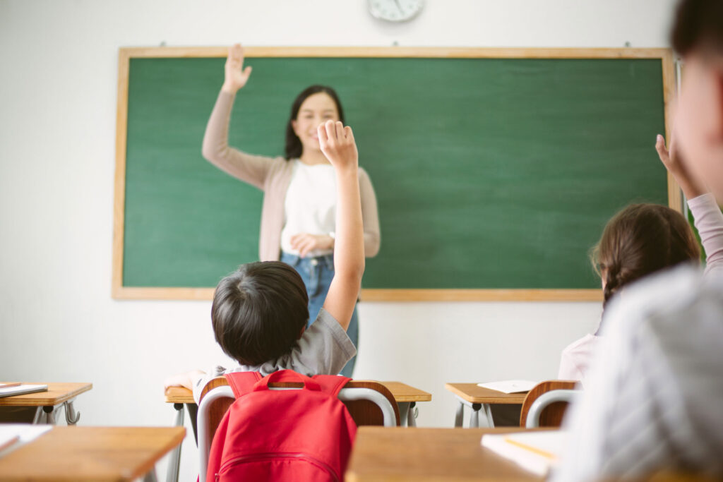 schoolboy with teacher sitting in classroom and ra 2022 03 30 15 00 04 utc - Brightschool